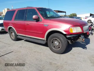 1999 Ford Expedition XLT z VIN 1FMPU18L8XLC43471, wystawiony jako IAAI lot #42391942 z przebiegiem 123 665 mil mil oraz . Historia ofert i sprzedaży dostępna na DreamBid. Obrazek 1.