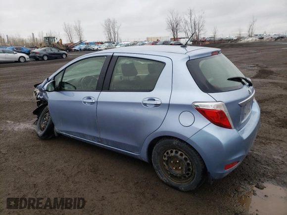 2012 Toyota Yaris L with VIN JTDKTUD33CD517298, listed as a Copart auction lot 52099335 with Not Provided miles and Salvage Title. Bid and sale history available at DreamBid. Image 2.