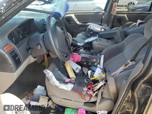 1999 Jeep Grand Cherokee Laredo с VIN 1J4G258S9XC758711, выставлен на аукционе Copart как лот 58420835 с пробегом Не указан миль и Списание • Salvage title. История ставок и продаж доступна на DreamBid. Изображение 7.