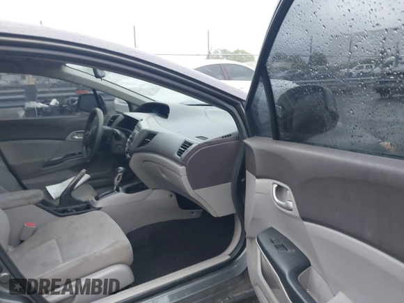 2012 Honda Civic LX with VIN 2HGFB2F58CH593658, listed as a IAAI auction lot 41965400 with 172,340 mi miles and . Bid and sale history available at DreamBid. Image 5.