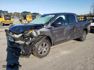 2020 Honda Ridgeline RTL-E with VIN 5FPYK3F73LB004964, listed as a Copart auction lot 44804305 with 29,116 mi miles and Salvage Title. Bid and sale history available at carsss.com. Image 1.