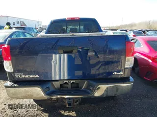 2013 Toyota Tundra z VIN 5TFUM5F14DX043076, wystawiony jako IAAI lot #41633905 z przebiegiem 157 850 mil mil oraz . Historia ofert i sprzedaży dostępna na DreamBid. Obrazek 16.