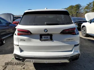 2022 BMW X5 sDrive40i with VIN 5UXCR4C01N9J97204, listed as a Copart auction lot 88157405 with 34,788 mi miles and Salvage Title. Bid and sale history available at carsss.com. Image 6.