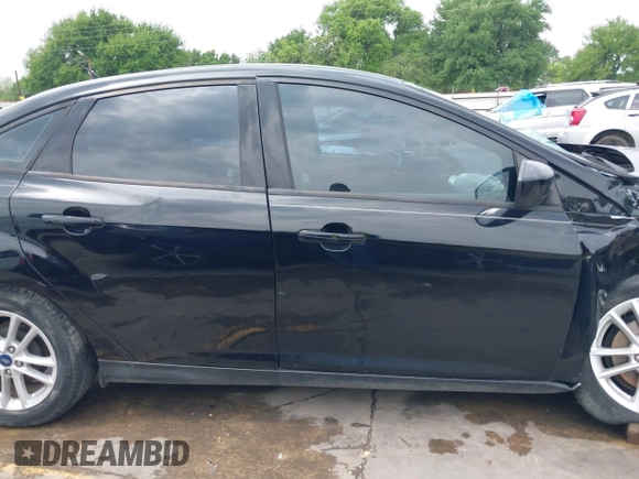 2018 Ford Focus SE with VIN 1FADP3F22JL311975, listed as a IAAI auction lot 41934856 with 68,974 mi miles. Bid and sale history available at carsss.com. Image 14.