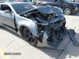 2021 Chevrolet Camaro 1LT z VIN 1G1FB1RX9M0125698, wystawiony jako IAAI lot #41824653 z przebiegiem 69 365 mil mil oraz . Historia ofert i sprzedaży dostępna na DreamBid. Obrazek 18.