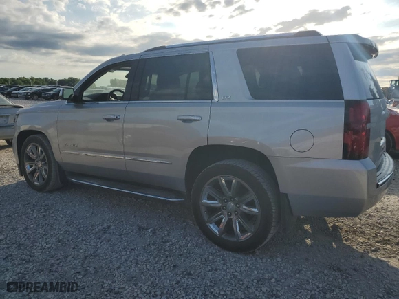 2016 Chevrolet Tahoe LTZ with VIN 1GNSKCKC1GR127686, listed as a Copart auction lot 58116154 with 100,722 mi miles and Salvage Title. Bid and sale history available at carsss.com. Image 2.