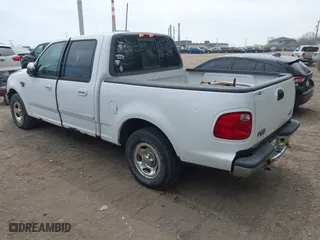 2001 Ford F-150 SuperCrew XLT with VIN 1FTRW07LX1KA24415, listed as a IAAI auction lot 42081030 with 298,673 mi miles. Bid and sale history available at carsss.com. Image 3.