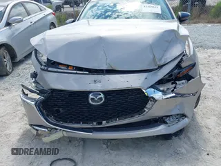 2022 Mazda 3 2.5 Turbo with VIN 3MZBPBAY8NM300598, listed as a IAAI auction lot 42569553 with 27,736 mi miles and . Bid and sale history available at DreamBid. Image 6.