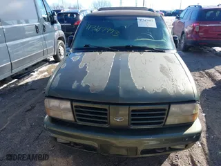 2001 Oldsmobile Bravada with VIN 1GHDT13W312184767, listed as a IAAI auction lot 41347993 with 130,306 mi miles. Bid and sale history available at carsss.com. Image 6.