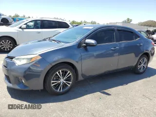 2016 Toyota Corolla L with VIN 5YFBURHE3GP521974, listed as a Copart auction lot 63829805 with 101,931 mi miles and Salvage title. Bid and sale history available at DreamBid. Image 1.