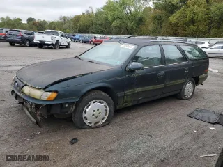 1995 Ford Taurus GL with VIN 1FALP57U7SA210516, listed as a Copart auction lot 73996664 with 131,220 mi miles and Clean Title. Bid and sale history available at carsss.com. Image 1.