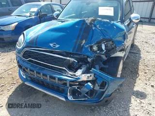 2018 MINI Countryman Cooper S with VIN WMZYT5C30J3E60548, listed as a IAAI auction lot 41890016 with 75,769 mi miles and . Bid and sale history available at DreamBid. Image 6.