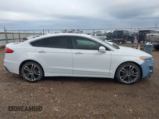 2019 Ford Fusion Titanium with VIN 3FA6P0D93KR138574, listed as a IAAI auction lot 41967094 with 118,297 mi miles. Bid and sale history available at carsss.com. Image 13.