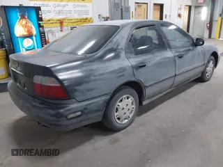 1997 Honda Accord DX with VIN 1HGCD5621VA005525, listed as a IAAI auction lot 42218121 with 196,053 mi miles and . Bid and sale history available at carsss.com. Image 4.