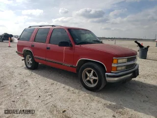 1999 Chevrolet Tahoe with VIN 1GNEC13R7XJ363159, listed as a Copart auction lot 45879745 with 415,963 mi miles and Clean Title. Bid and sale history available at carsss.com. Image 4.
