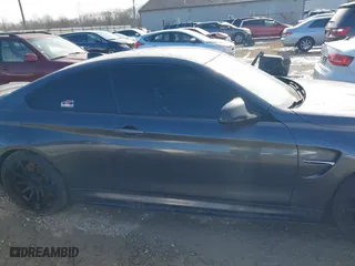 2015 BMW M4 with VIN WBS3R9C57FK334921, listed as a IAAI auction lot 41869773 with 107,058 mi miles. Bid and sale history available at carsss.com. Image 13.
