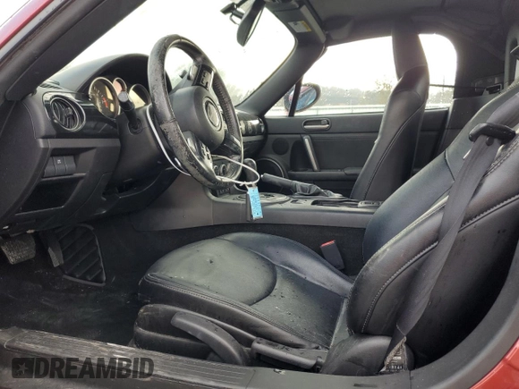 2015 Mazda MX-5 Miata Grand Touring z VIN JM1NC2PF8F0240439, wystawiony jako Copart lot #79513224 z przebiegiem 121 540 mil mil oraz Szkoda całkowita • Salvage title. Historia ofert i sprzedaży dostępna na DreamBid. Obrazek 7.