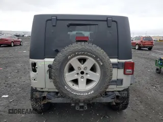 2007 Jeep Wrangler Unlimited Rubicon с VIN 1J8GA691X7L191115, выставлен на аукционе Copart как лот 87523925 с пробегом 85 709 миль миль и Списание • Salvage title. История ставок и продаж доступна на DreamBid. Изображение 6.