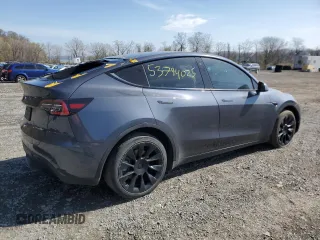 2021 Tesla Model Y Long Range with VIN 5YJYGDEE9MF119974, listed as a Copart auction lot 53794025 with 66,411 mi miles and Salvage Title. Bid and sale history available at DreamBid. Image 3.