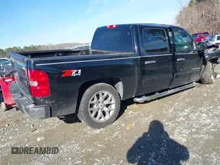 2011 Chevrolet Silverado 1500 LT with VIN 3GCPKSE34BG326812, listed as a IAAI auction lot 41446991 with 149,952 mi miles. Bid and sale history available at carsss.com. Image 4.