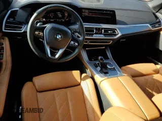 2023 BMW X5 sDrive40i with VIN 5UXCR4C0XP9P08573, listed as a Copart auction lot 85560524 with 67,939 mi miles and Salvage title. Bid and sale history available at DreamBid. Image 8.
