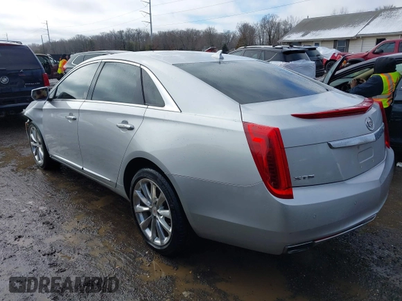 2013 Cadillac XTS Premium with VIN 2G61S5S36D9111444, listed as a IAAI auction lot 41558500 with 101,223 mi miles. Bid and sale history available at carsss.com. Image 3.