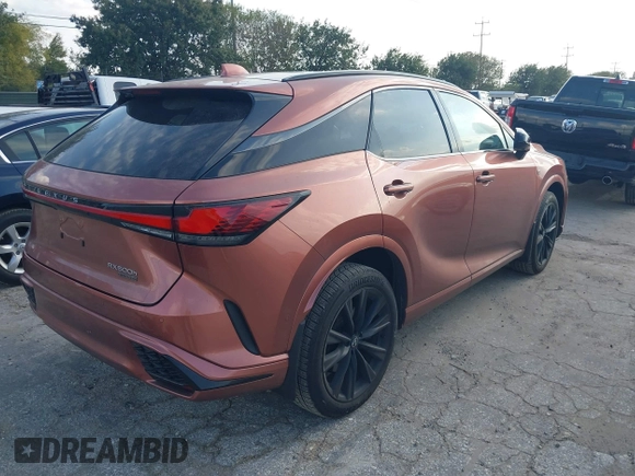 2024 Lexus RX 500h F Sport Performance z VIN 2T2BCMEA8RC014297, wystawiony jako IAAI lot #40790867 z przebiegiem 8 417 mil mil oraz . Historia ofert i sprzedaży dostępna na DreamBid. Obrazek 4.