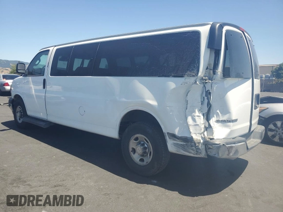 2019 Chevrolet Express Passenger LT with VIN 1GAZGPFG4K1252856, listed as a Copart auction lot 57459135 with 159,676 mi miles and Salvage title. Bid and sale history available at DreamBid. Image 2.