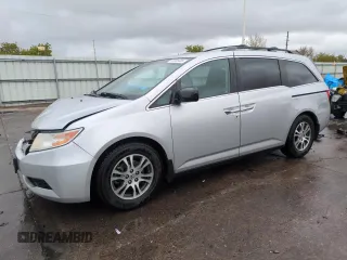 2012 Honda Odyssey EX-L with VIN 5FNRL5H68CB141022, listed as a Copart auction lot 54605485 with 185,388 mi miles and Salvage Title. Bid and sale history available at carsss.com. Image 1.