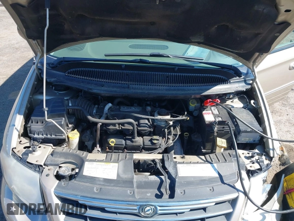 2006 Chrysler Town & Country Touring with VIN 2A8GP54L06R727898, listed as a IAAI auction lot 41893586 with 119,296 mi miles and . Bid and sale history available at DreamBid. Image 10.