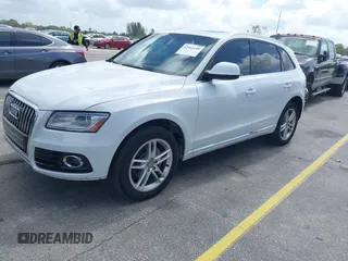 2014 Audi Q5 Premium Plus with VIN WA1LFAFP9EA124785, listed as a IAAI auction lot 42511649 with 99,109 mi miles and . Bid and sale history available at DreamBid. Image 2.