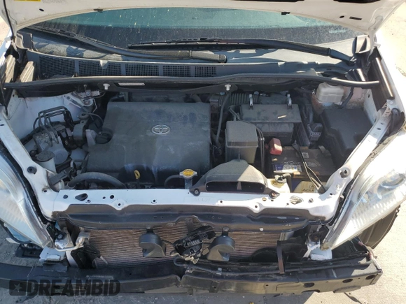 2015 Toyota Sienna LE with VIN 5TDJK3DC2FS126466, listed as a Copart auction lot 61165105 with 56,634 mi miles and Salvage title. Bid and sale history available at DreamBid. Image 12.