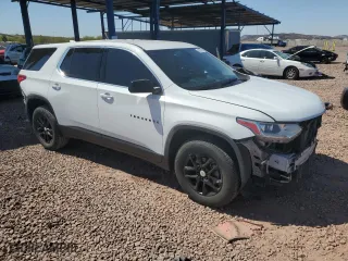 2019 Chevrolet Traverse LS with VIN 1GNERFKW6KJ138968, listed as a Copart auction lot 50035685 with 132,800 mi miles and Salvage Title. Bid and sale history available at carsss.com. Image 4.