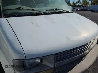2000 Chevrolet Astro Cargo z VIN 1GCDM19W4YB196124, wystawiony jako IAAI lot #42398481 z przebiegiem 200 414 mil mil oraz . Historia ofert i sprzedaży dostępna na DreamBid. Obrazek 23.