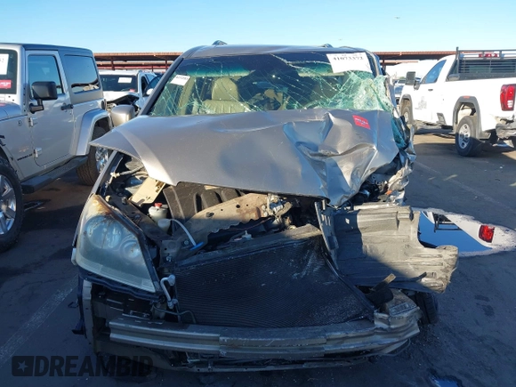 2005 Honda Odyssey EX-L with VIN 5FNRL38755B063203, listed as a IAAI auction lot 41073372 with Not provided miles and . Bid and sale history available at DreamBid. Image 12.