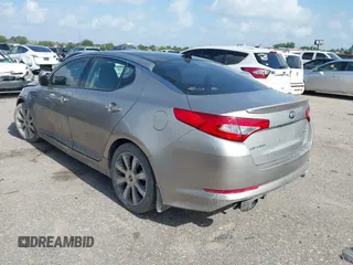 2013 Kia Optima SX with VIN 5XXGR4A63DG231400, listed as a IAAI auction lot 42518098 with 168,364 mi miles and . Bid and sale history available at DreamBid. Image 3.