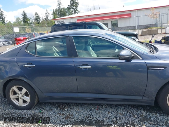 2015 Kia Optima LX z VIN KNAGM4A74F5590332, wystawiony jako IAAI lot #42304364 z przebiegiem 131 720 mil mil oraz . Historia ofert i sprzedaży dostępna na DreamBid. Obrazek 13.