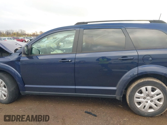 2019 Dodge Journey SE with VIN 3C4PDCBB5KT821412, listed as a IAAI auction lot 40901003 with 27,099 mi miles and . Bid and sale history available at DreamBid. Image 14.