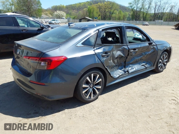 2023 Honda Civic Sedan EX with VIN 2HGFE1F71PH324023, listed as a IAAI auction lot 39256308 with 6,451 mi miles. Bid and sale history available at carsss.com. Image 4.
