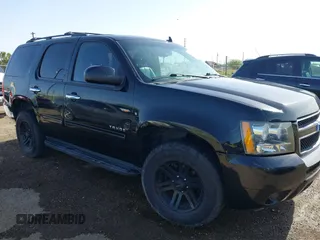2011 Chevrolet Tahoe LT z VIN 1GNSCBE01BR160656, wystawiony jako IAAI lot #41822149 z przebiegiem 248 195 mil mil oraz . Historia ofert i sprzedaży dostępna na DreamBid. Obrazek 1.