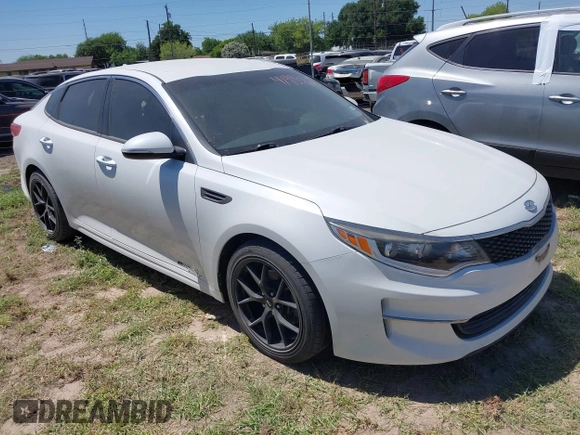 2016 Kia Optima LX z VIN 5XXGT4L30GG039814, wystawiony jako IAAI lot #41982126 z przebiegiem 70 854 mil mil oraz . Historia ofert i sprzedaży dostępna na DreamBid. Obrazek 1.