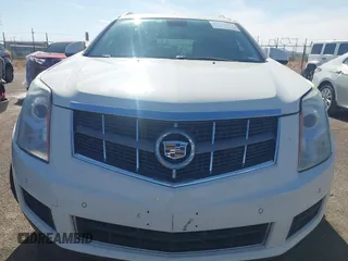 2012 Cadillac SRX Luxury Collection z VIN 3GYFNAE32CS518428, wystawiony jako IAAI lot #42153391 z przebiegiem 159 836 mil mil oraz . Historia ofert i sprzedaży dostępna na DreamBid. Obrazek 13.
