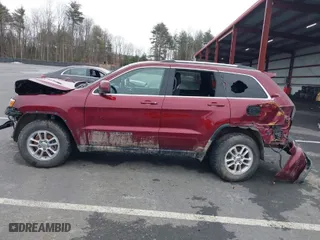 2019 Jeep Grand Cherokee Laredo E with VIN 1C4RJFAG2KC814154, listed as a IAAI auction lot 38877814 with 54,119 mi miles. Bid and sale history available at carsss.com. Image 15.