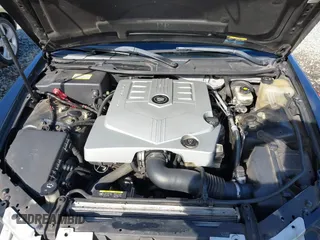 2005 Cadillac STS with VIN 1G6DW677250190268, listed as a IAAI auction lot 41702798 with 142,427 mi miles. Bid and sale history available at carsss.com. Image 10.