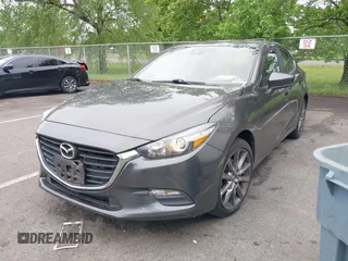 2018 Mazda 3 Touring z VIN 3MZBN1V31JM268280, wystawiony jako IAAI lot #42276418 z przebiegiem 58 366 mil mil oraz . Historia ofert i sprzedaży dostępna na DreamBid. Obrazek 2.
