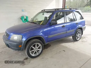2001 Honda CR-V LX with VIN JHLRD28451C005857, listed as a IAAI auction lot 42004556 with 211,403 mi miles. Bid and sale history available at carsss.com. Image 17.