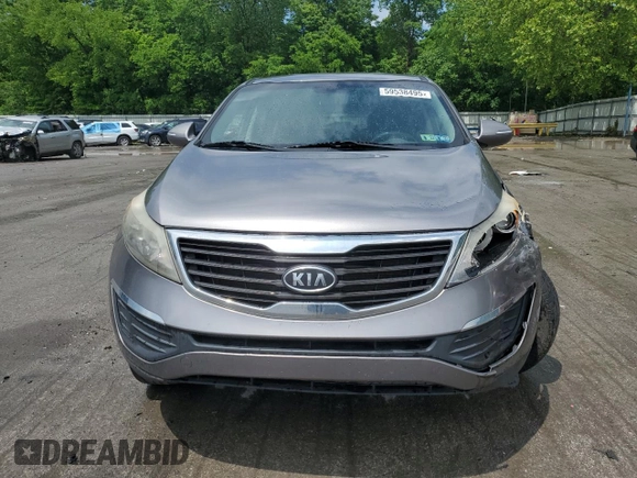 2012 Kia Sportage LX z VIN KNDPBCA24C7263100, wystawiony jako Copart lot #59538495 z przebiegiem 212 750 mil mil oraz Szkoda całkowita • Salvage title. Historia ofert i sprzedaży dostępna na DreamBid. Obrazek 5.