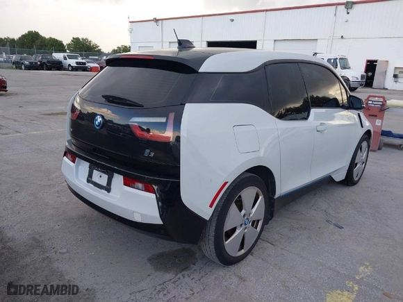 2015 BMW i3 with VIN WBY1Z4C59FV503755, listed as a IAAI auction lot 41654699 with NaN miles. Bid and sale history available at carsss.com. Image 4.