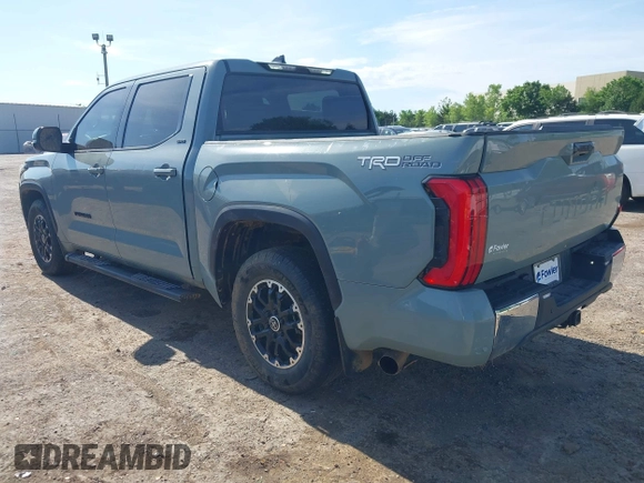 2022 Toyota Tundra SR5 with VIN 5TFLA5AB7NX013477, listed as a IAAI auction lot 42172272 with 30,460 mi miles and . Bid and sale history available at DreamBid. Image 3.