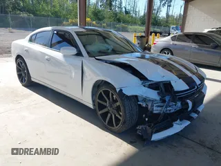 2015 Dodge Charger SE z VIN 2C3CDXBGXFH856953, wystawiony jako IAAI lot #42386650 z przebiegiem Nie podano mil oraz . Historia ofert i sprzedaży dostępna na DreamBid. Obrazek 1.